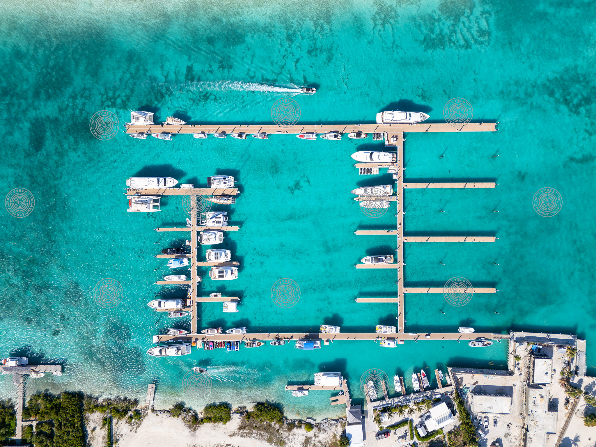 Drone shot of yachts docked in Blue Haven Marina