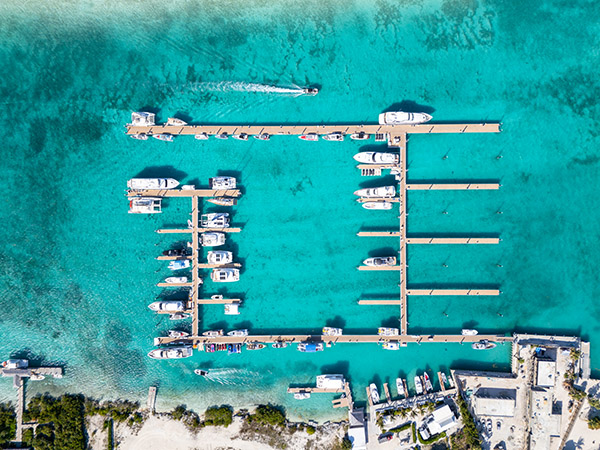 Drone shot of yachts docked in Blue Haven Marina