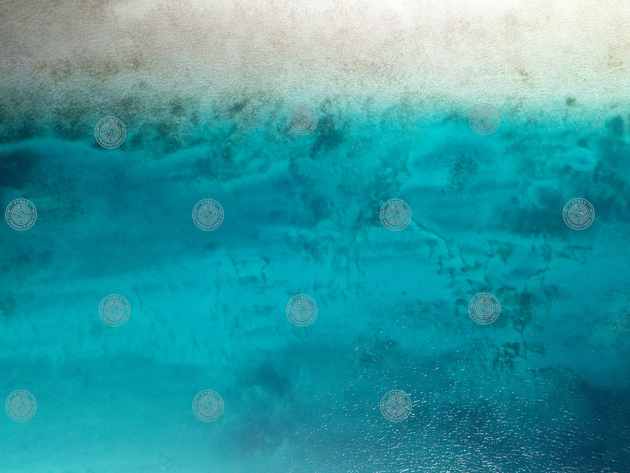 Top down drone shot of empty Grace Bay Beach