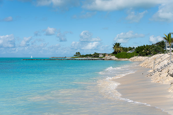 Handheld shot of Grace Bay Beach near villas in Leeward