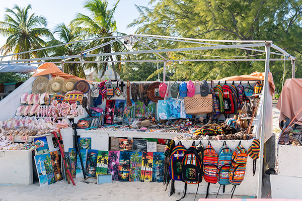 Handheld shot of beachside local goods stand near Da Conch Shack