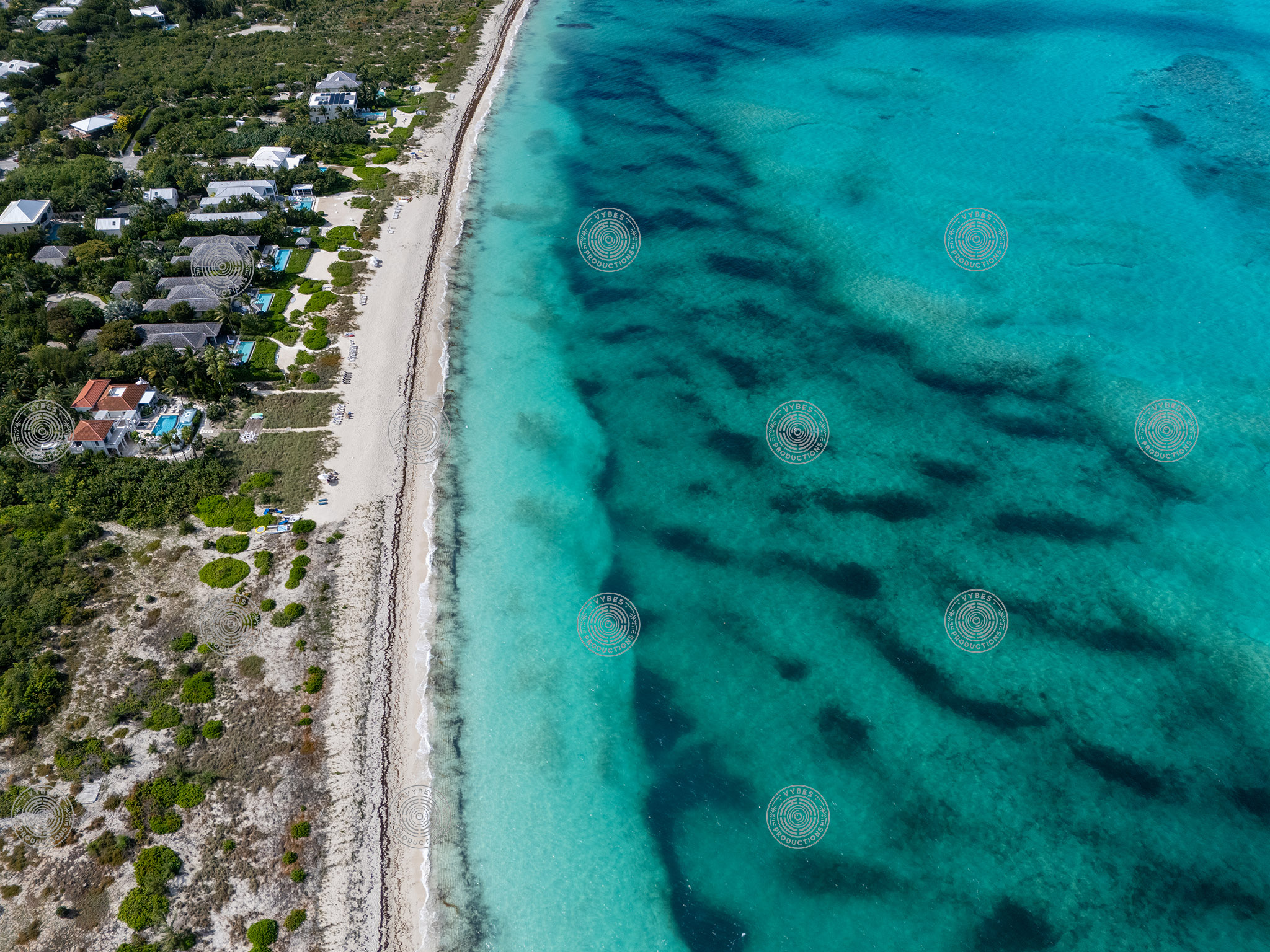 Aerial view of deep turquoise waters on Grace Bay Beach