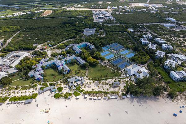 Drone shot of Club Med with pickleball and tennis courts
