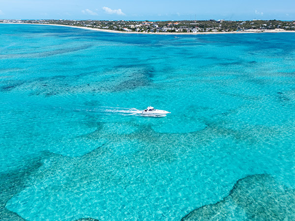 Drone shot of yacht cruising