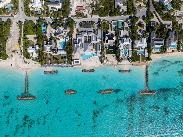 Top down drone shot of beachfront villas in Leeward