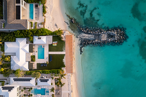 Close top down drone shot of luxury villas in Leeward