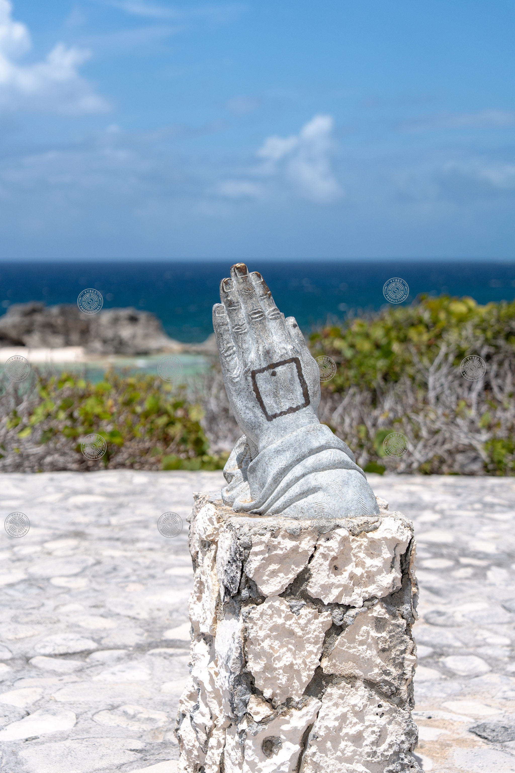 Circle of Hope (Praying Hands) statue in Mudjin Harbor, Middle Caicos