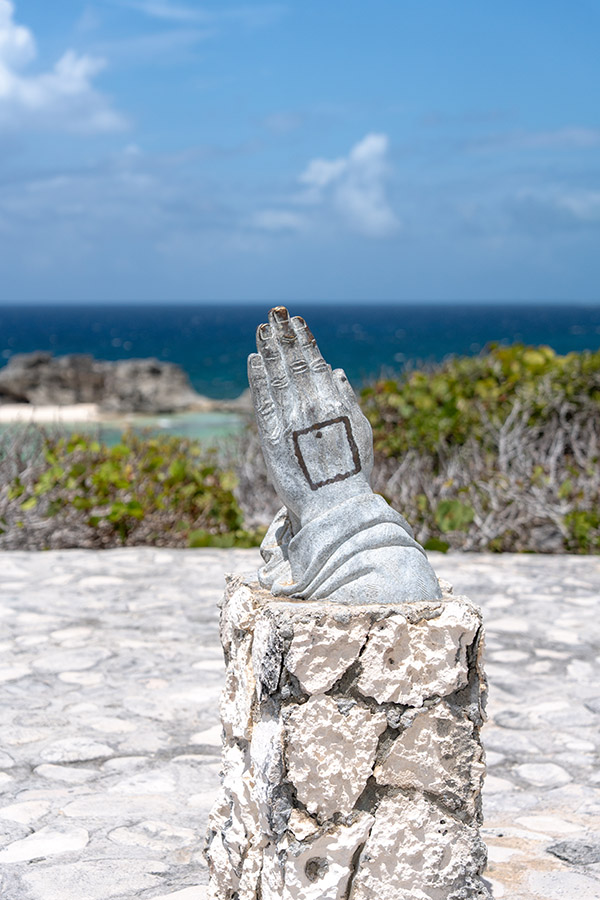 Circle of Hope (Praying Hands) statue in Mudjin Harbor, Middle Caicos