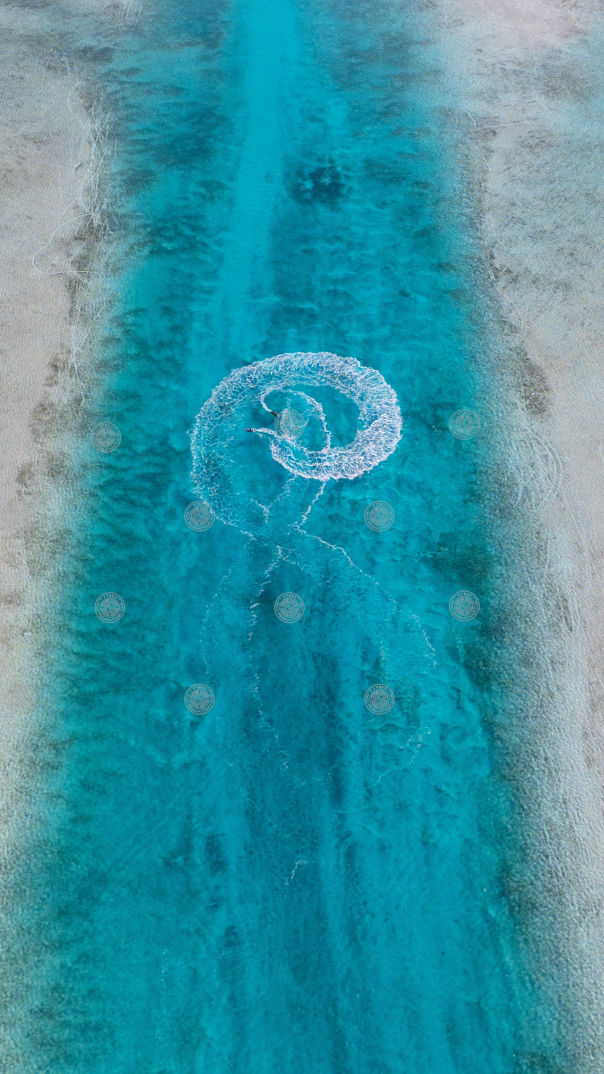 Drone shot of jetskis circling