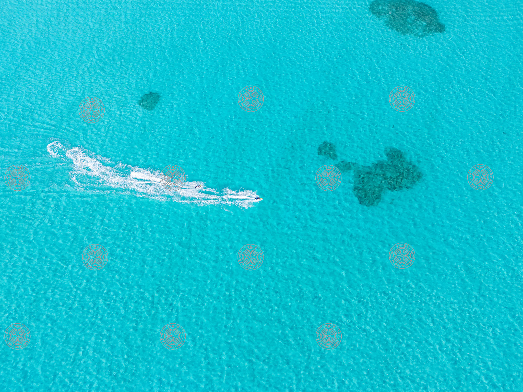 Jet Skis Carving Through Turquoise Waters