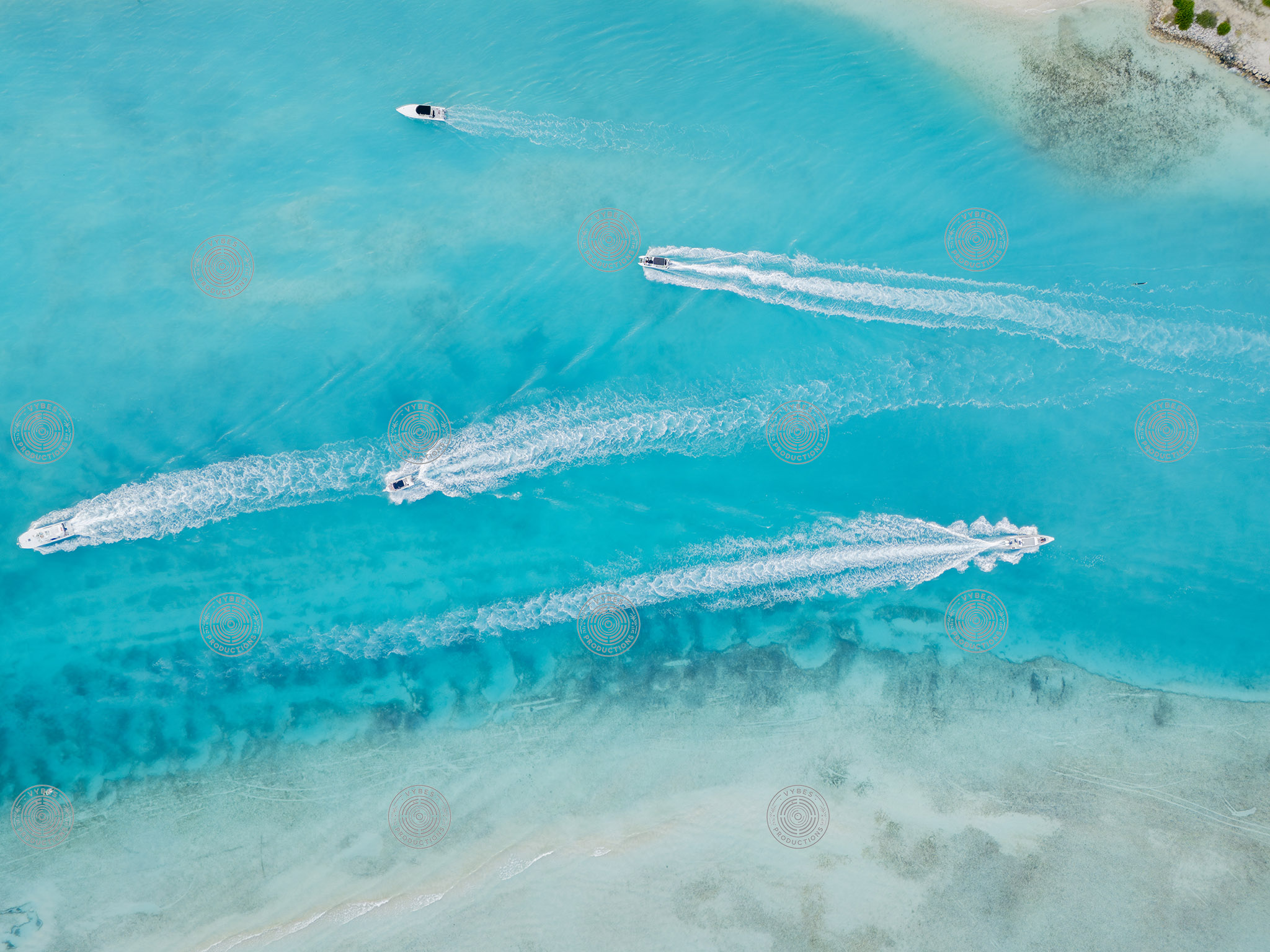 Top down drone shot showcasing jetskis around Emerald Point