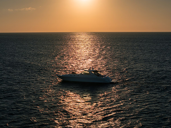 Sunset drone shot of a luxury yacht