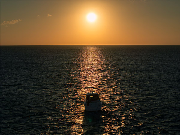 Sunset drone shot of a luxury yacht