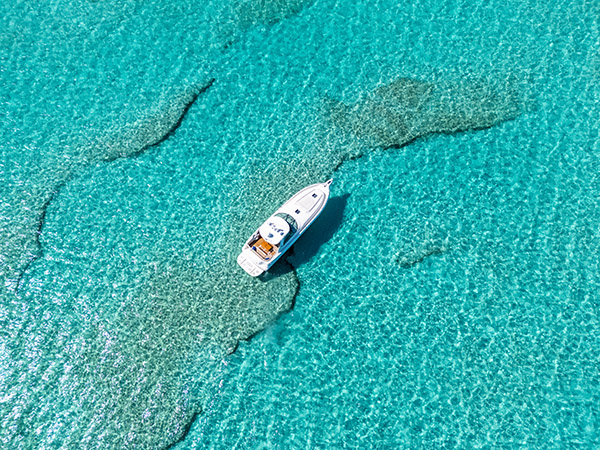 Drone shot of yacht cruising