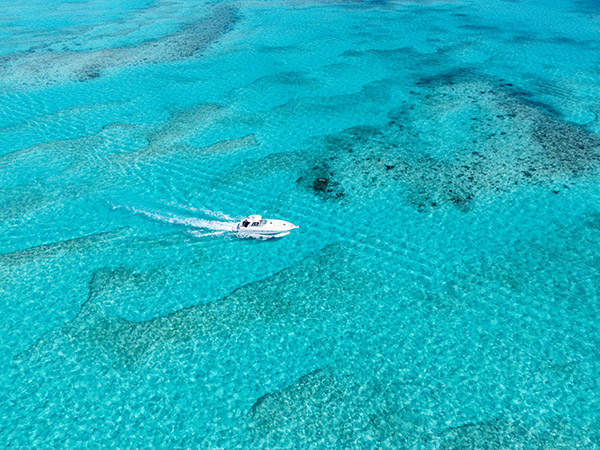 Drone shot of yacht cruising