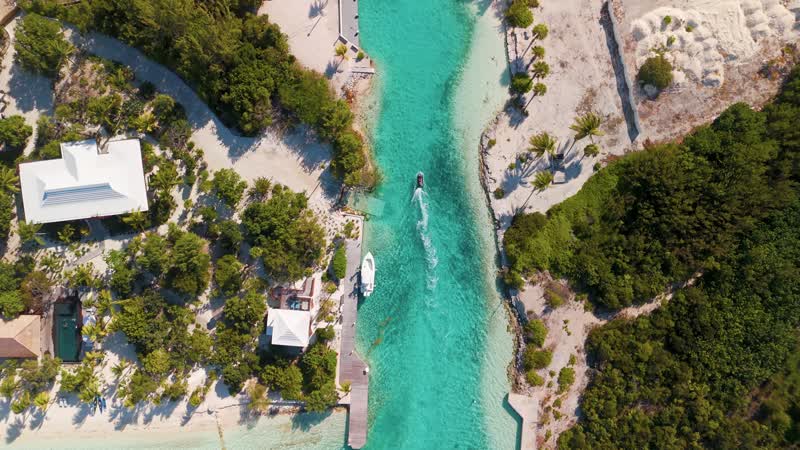 Top down shot of jetski moving through canals in Leeward