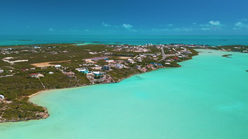 Aerial view of homes and buildings lining Chalk Sound