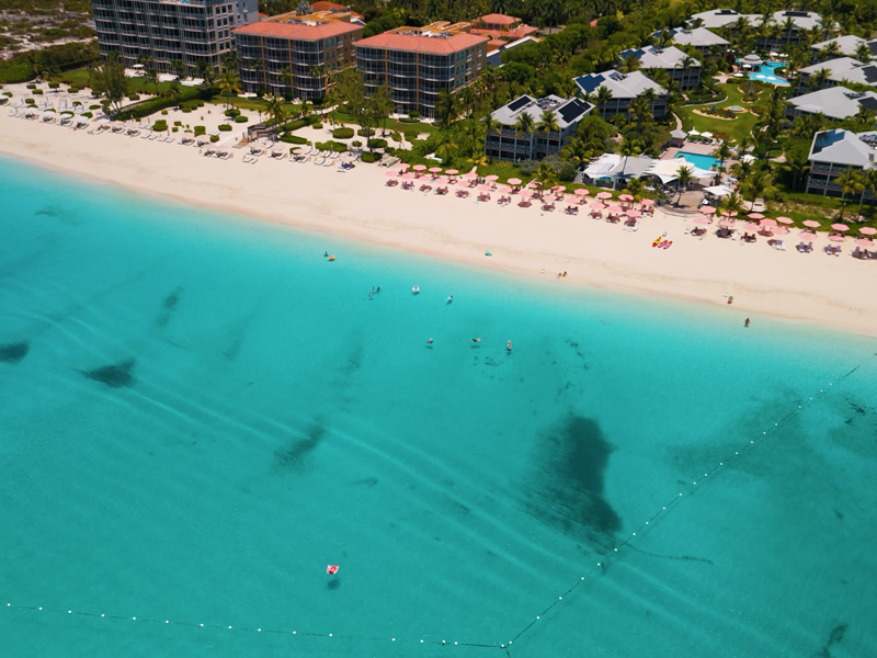 Grace Bay Beach drone clip with Ocean Club Resort in background