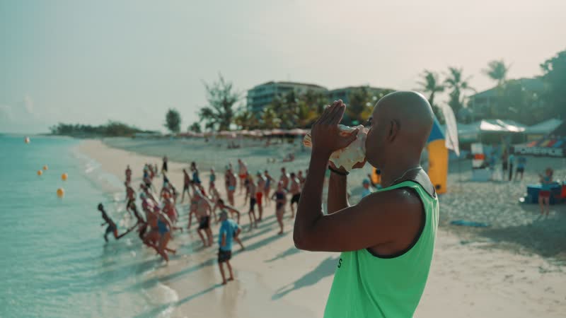Slow-motion shot of the start of a race at Grace Bay Beach