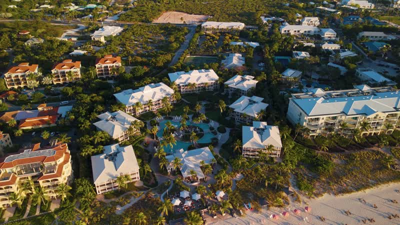 Drone shot of Ocean Club West along Grace Bay Beach
