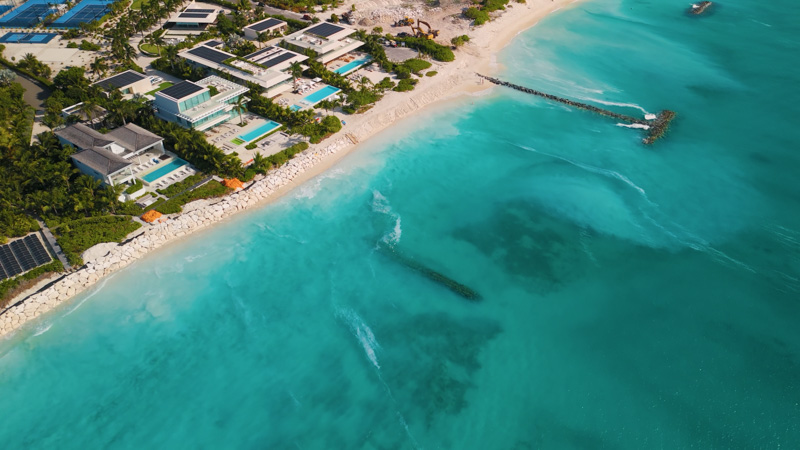 Dynamic drone showcasing luxury villas in Leeward