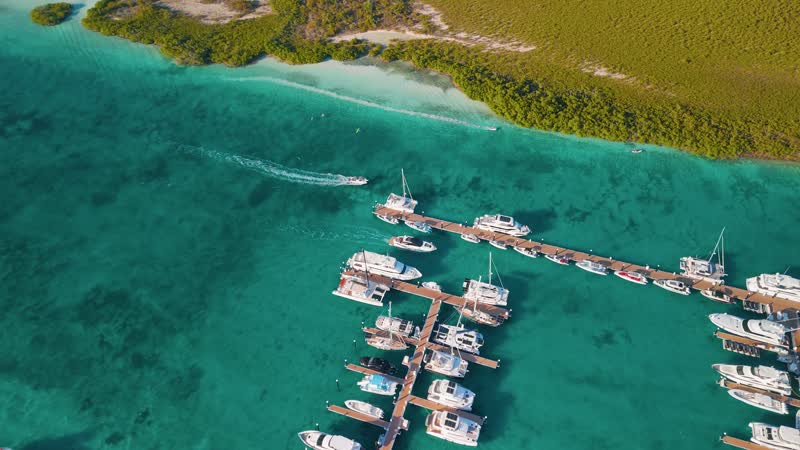 Aerial view of boat entering Blue Haven Marina
