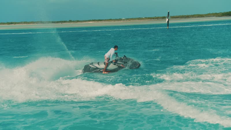 Handheld shot of tourist aggressively riding jetski