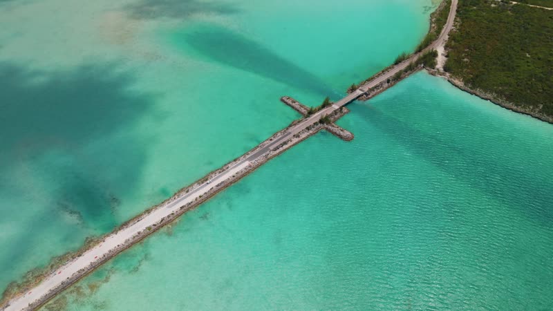 Drone shot following car cross Middle Caicos causeway
