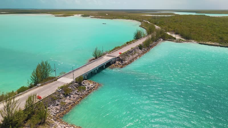 Drone shot following car cross Middle Caicos causeway