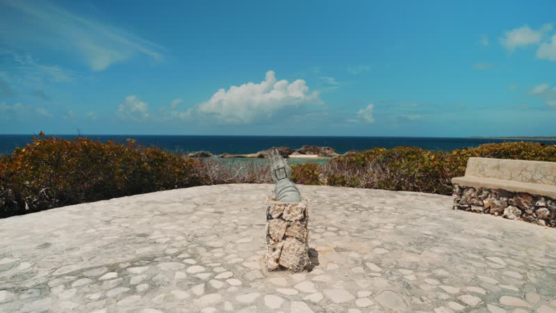 Handheld shot of famous praying statue in Mudjin Harbor, Middle Caicos