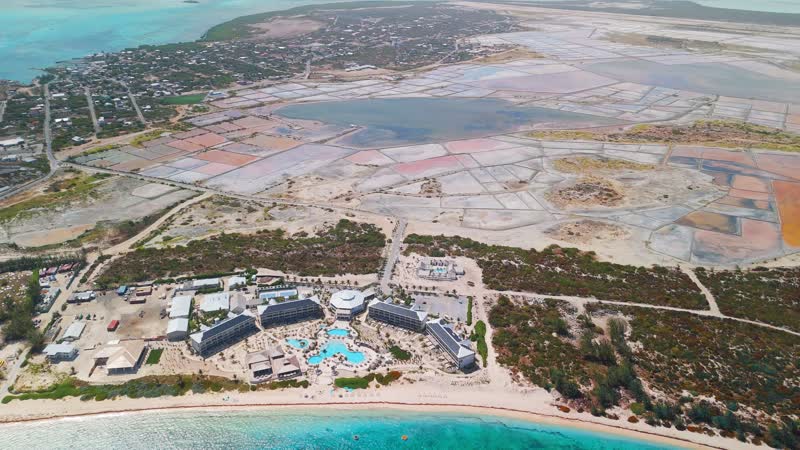 Drone shot of Salterra Resort in South Caicos with salt flats in background