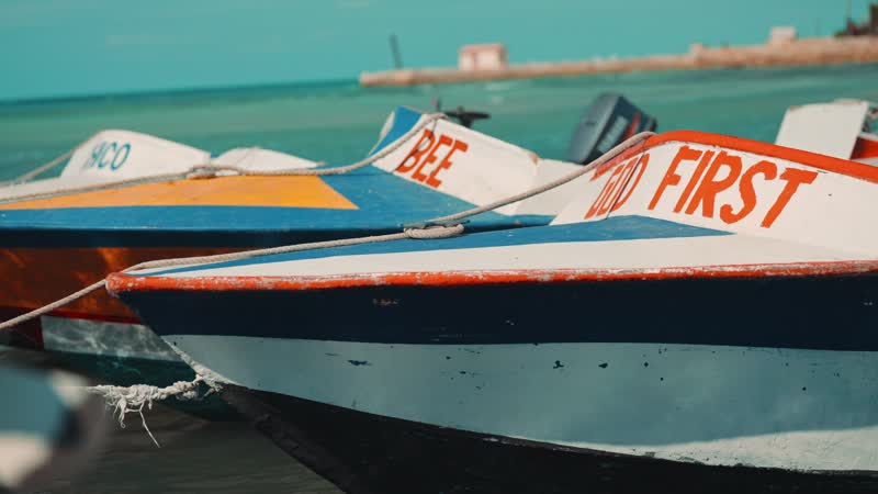 Slow-motion shot of small boats docked in South Caicos