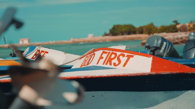 Slow-motion shot of small boats docked in South Caicos