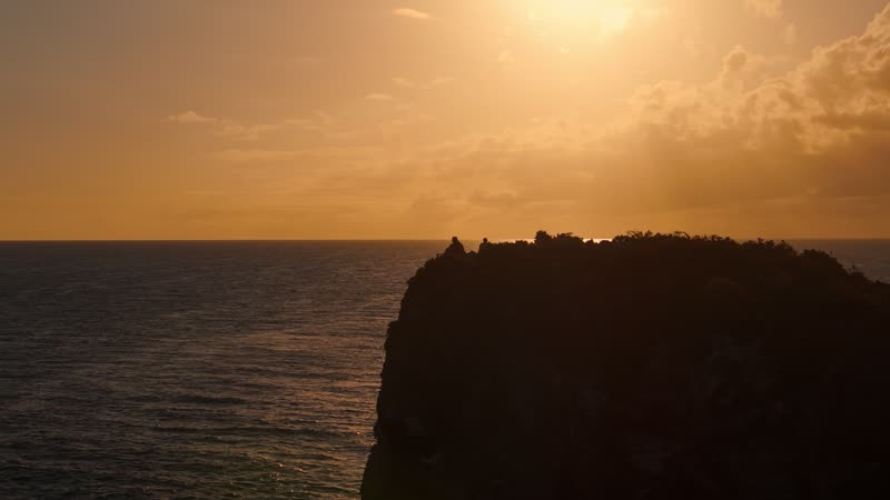 Sunset drone view of tourists looking out over Splitrock