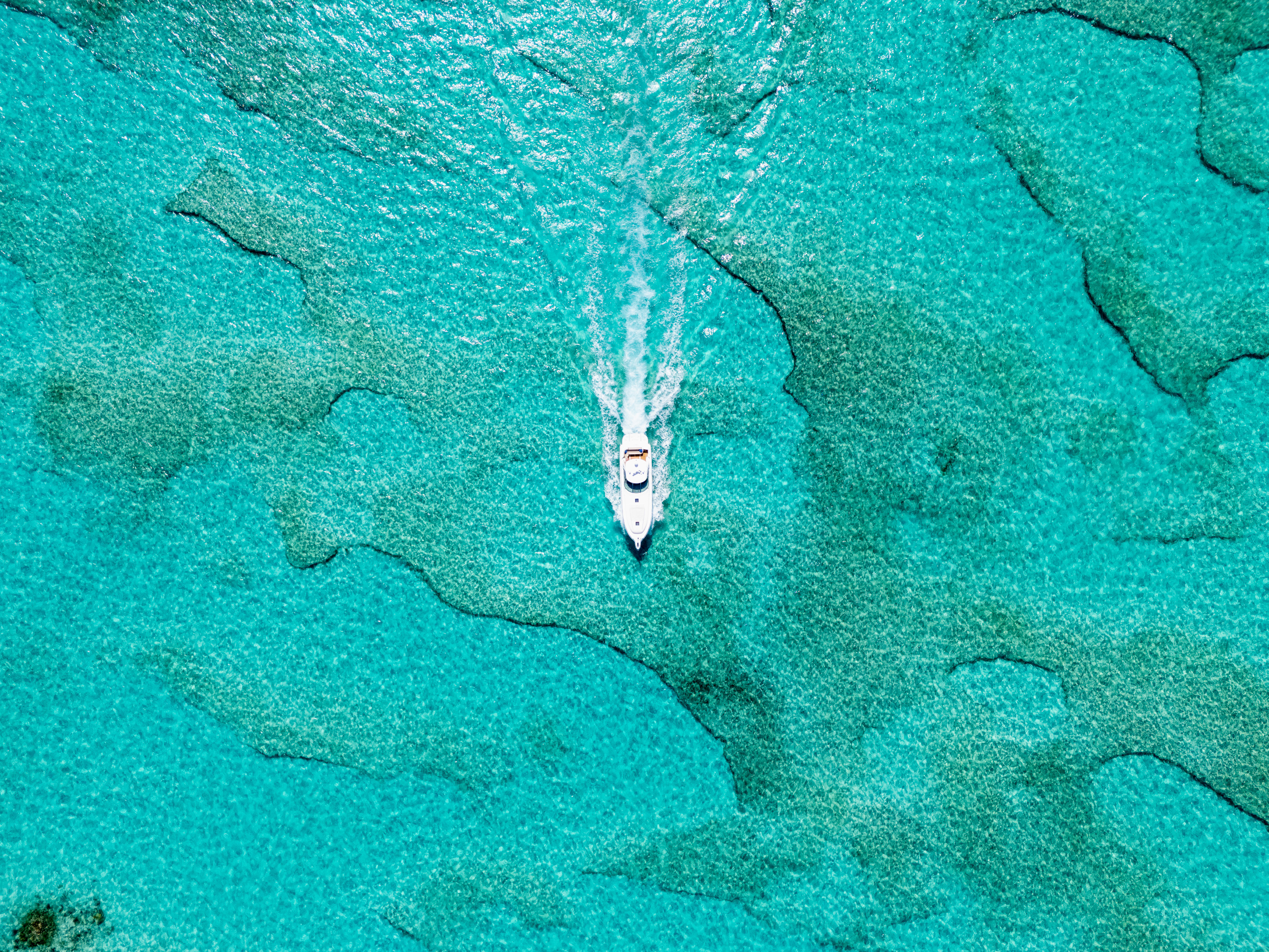 Yacht on crystal clear waters